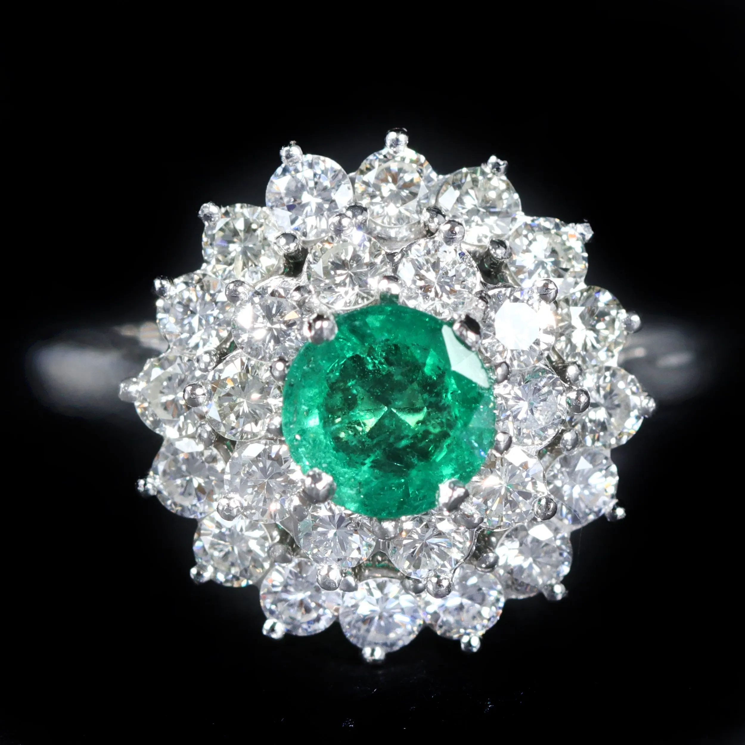 Estate Platinum 0.71 Carat Emerald and Diamond Ring