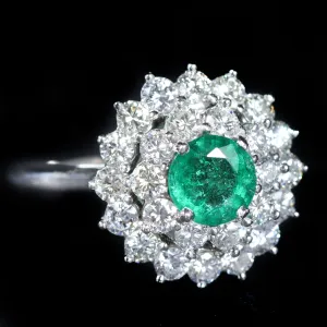 Estate Platinum 0.71 Carat Emerald and Diamond Ring