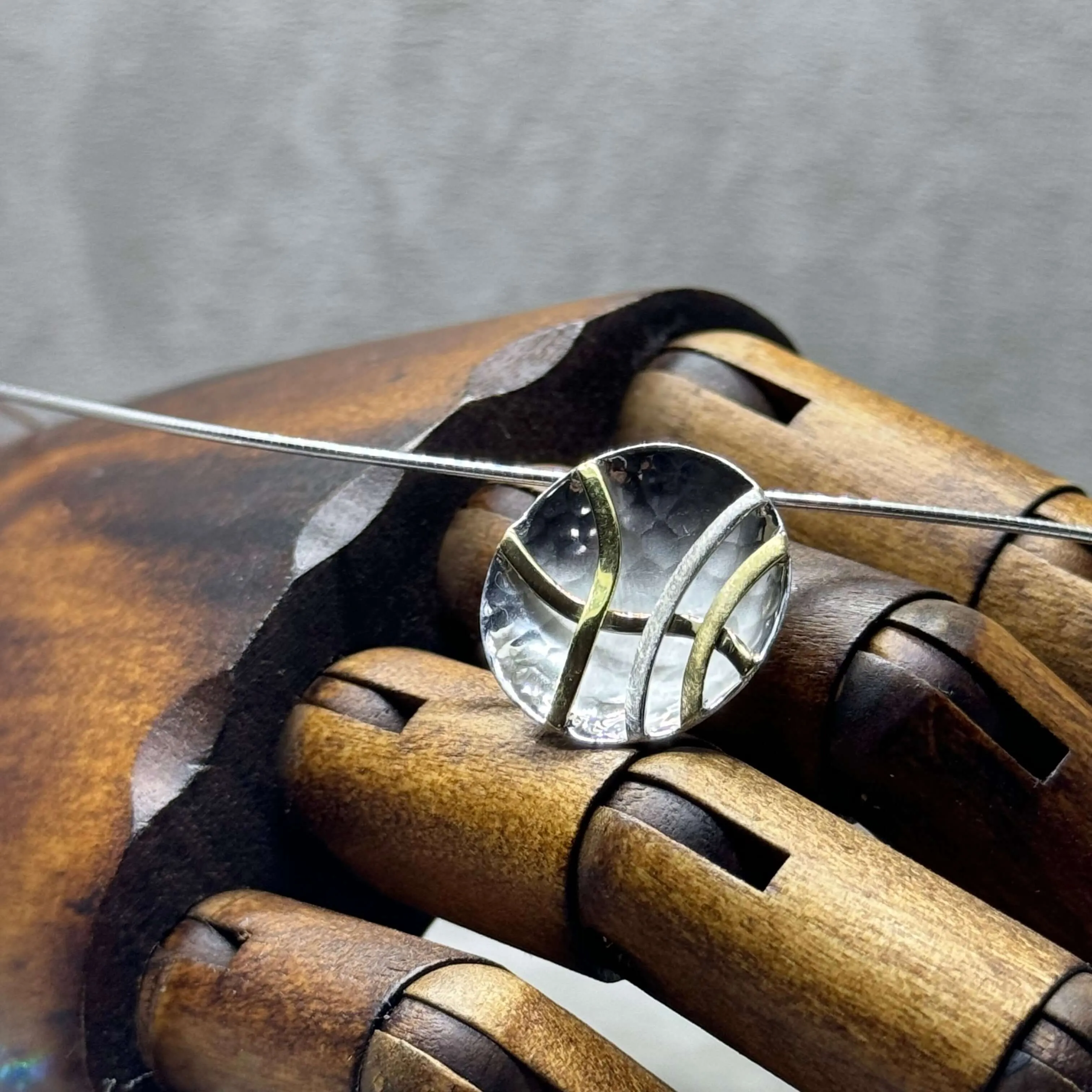 Hammered Sterling Silver Concave Disc Necklace with Linear Brass Details